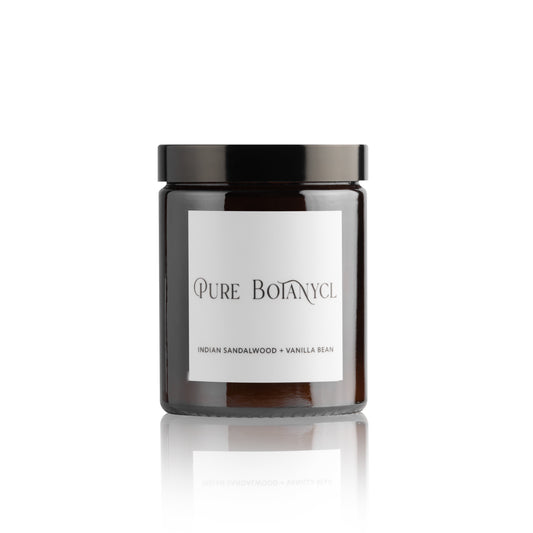 Pure Botanycl Soy Wax Candle in Indian Sandalwood and Vanilla Bean. Our Indian Sandalwood and Vanilla Bean Candle is an exotic aroma, combined with a hint of sweetness.   Combined into the formulation of this distinctive fragrance is a delightful dash of White Patchouli, Bergamot and Freesia.   As your candle continues to burn, the beautiful aromas of Clove, Cedarwood and Lilac will exude and enhance the full formulation of this one of a kind. 