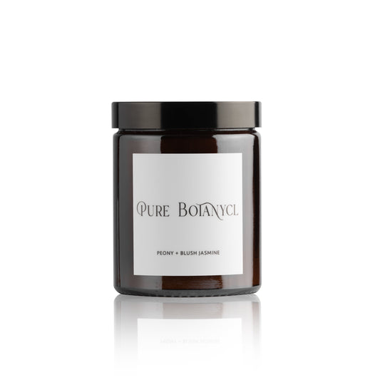 Pure Botanycl Candle in Peony and Blush Jasmine. This beautifully fragranced candle, engulfed in a fruity floral fragrance with notes of Peony, infused with hearty blends of Rose and Jasmine will steal your heart away. The fragrance is completed with soft notes of Violet, Patchouli, Plum and silky rich aromas of Musk and Dry Amber.